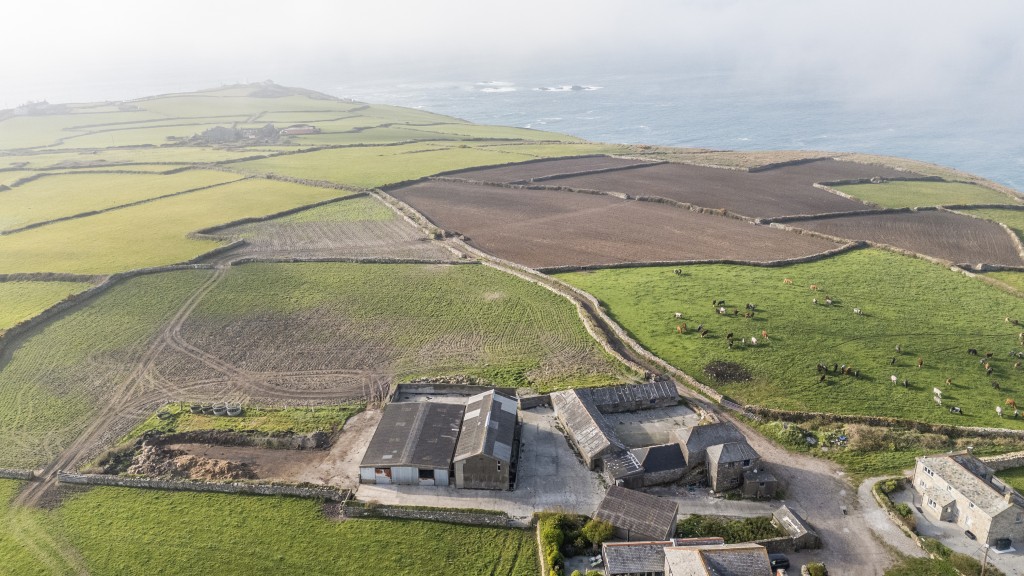 Lot: 3 - COMPLEX OF GRANITE BARNS, DUTCH BARN, CATTLE SHED FARMYARD AND LAND WITH POTENTIAL - Aerial view